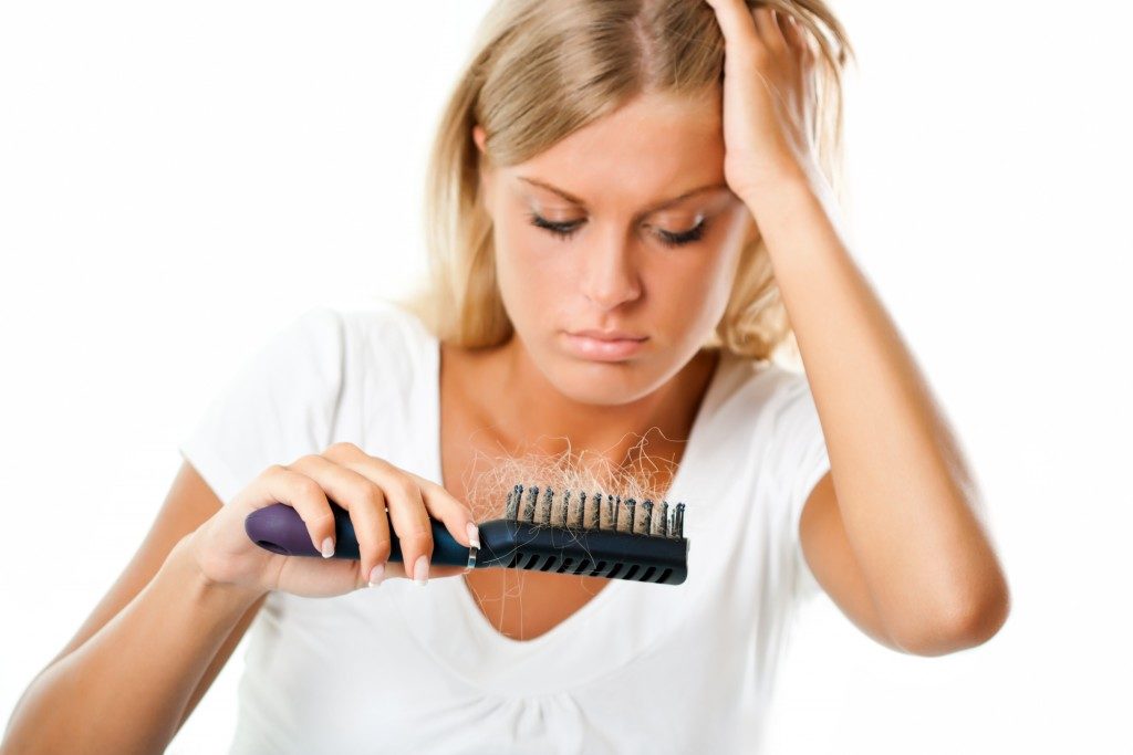 Woman worried of hair loss