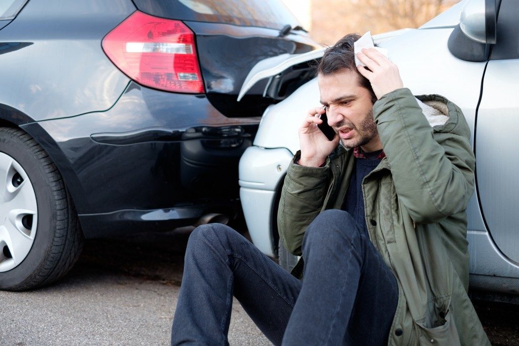 man calling about car crash