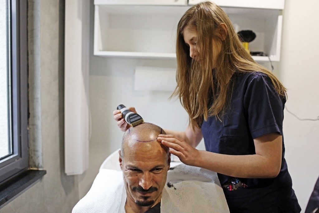 man having hair treatment