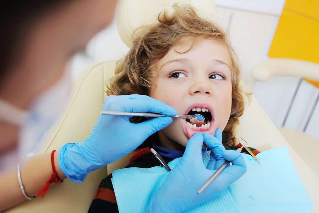 kid at the dentist