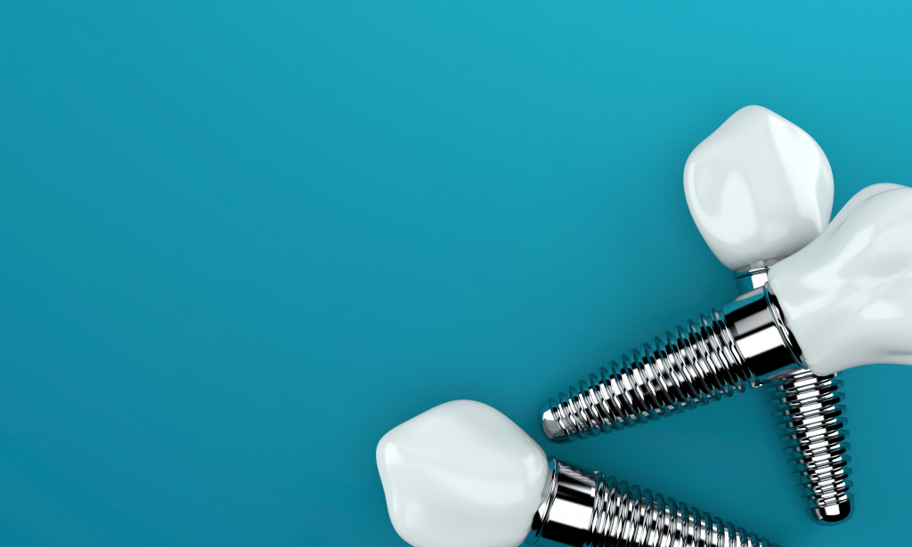 An image of dental implants on blue background