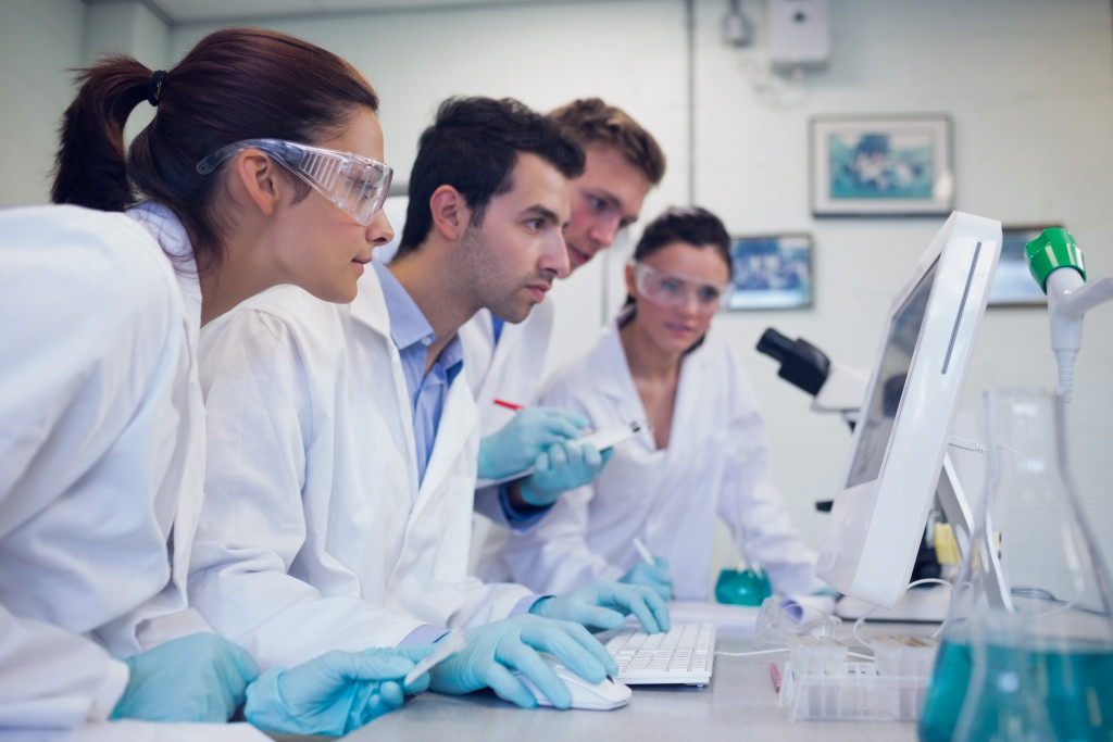 researchers working in the laboratory