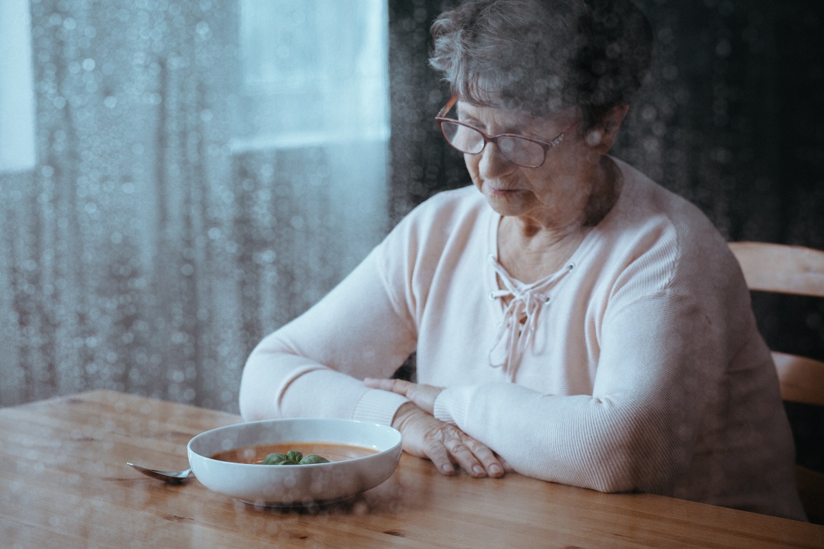 senior woman having lack of appetite